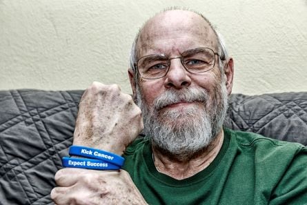 Man with a cancer bracelet