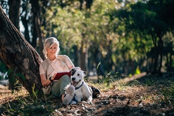 Woman hugging dog