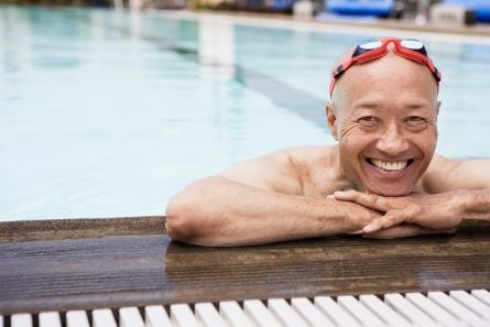 guy smiling in a pool