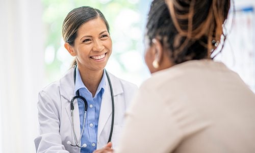 Female doctor with patient