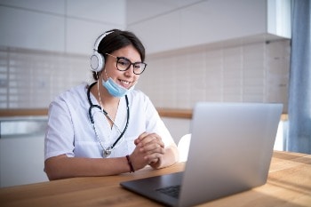 Caregiver listening to podcast