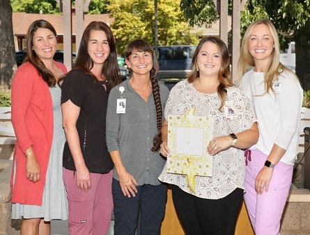 Jenay Holloway and a team of Enloe caregivers