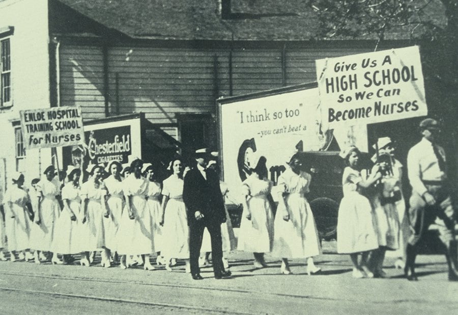 Dr. Enloe marching alongside nurses