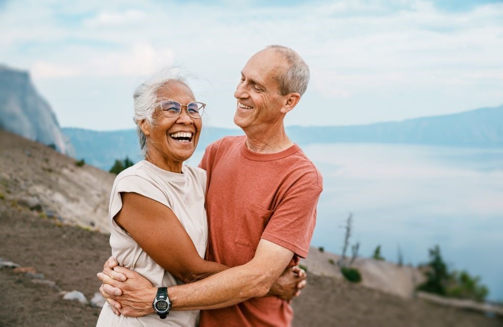 Man and woman hugging outside