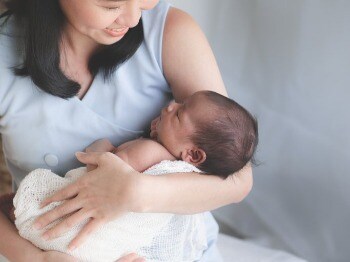 Happy mother with baby