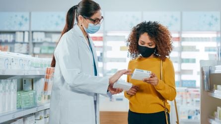 two folks in a pharmacy