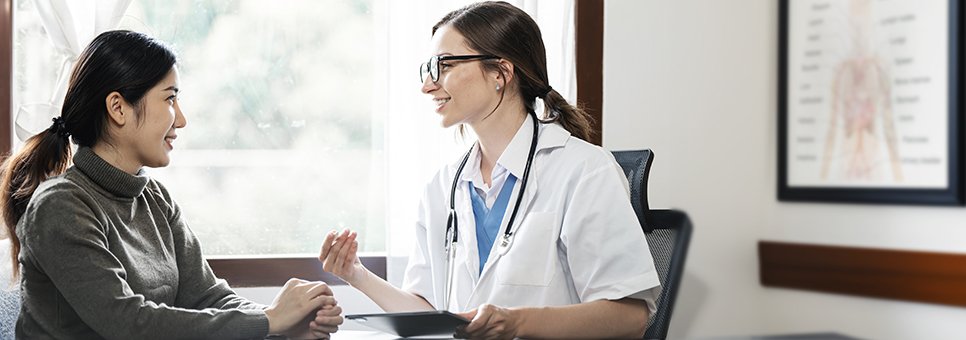 Female doctor with patient