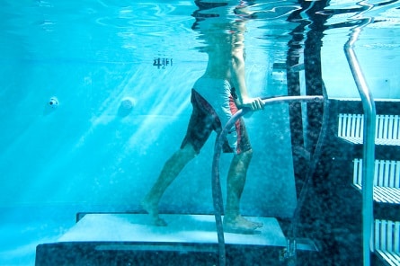 Man doing aquatic therapy