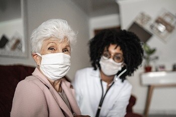 Grandmother with doctor