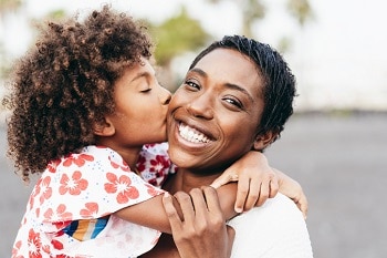 Happy woman with daughter 