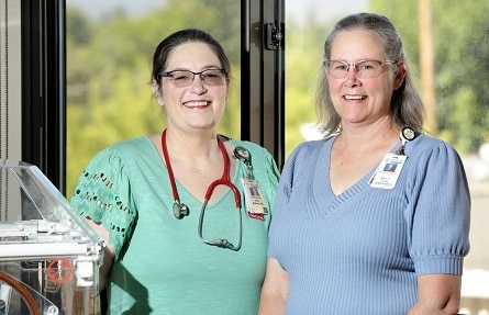 Receptionist smiling in hospital