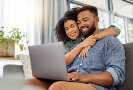 Happy Couple at Computer