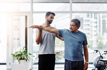 Male therapist with patient 