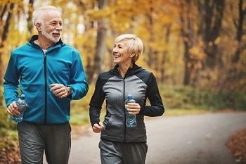 Happy Couple Walking in the Park