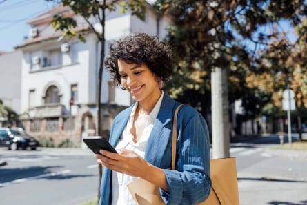 A woman looking at her smartphone